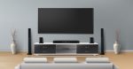 Tv on wall with tv stand in sitting room